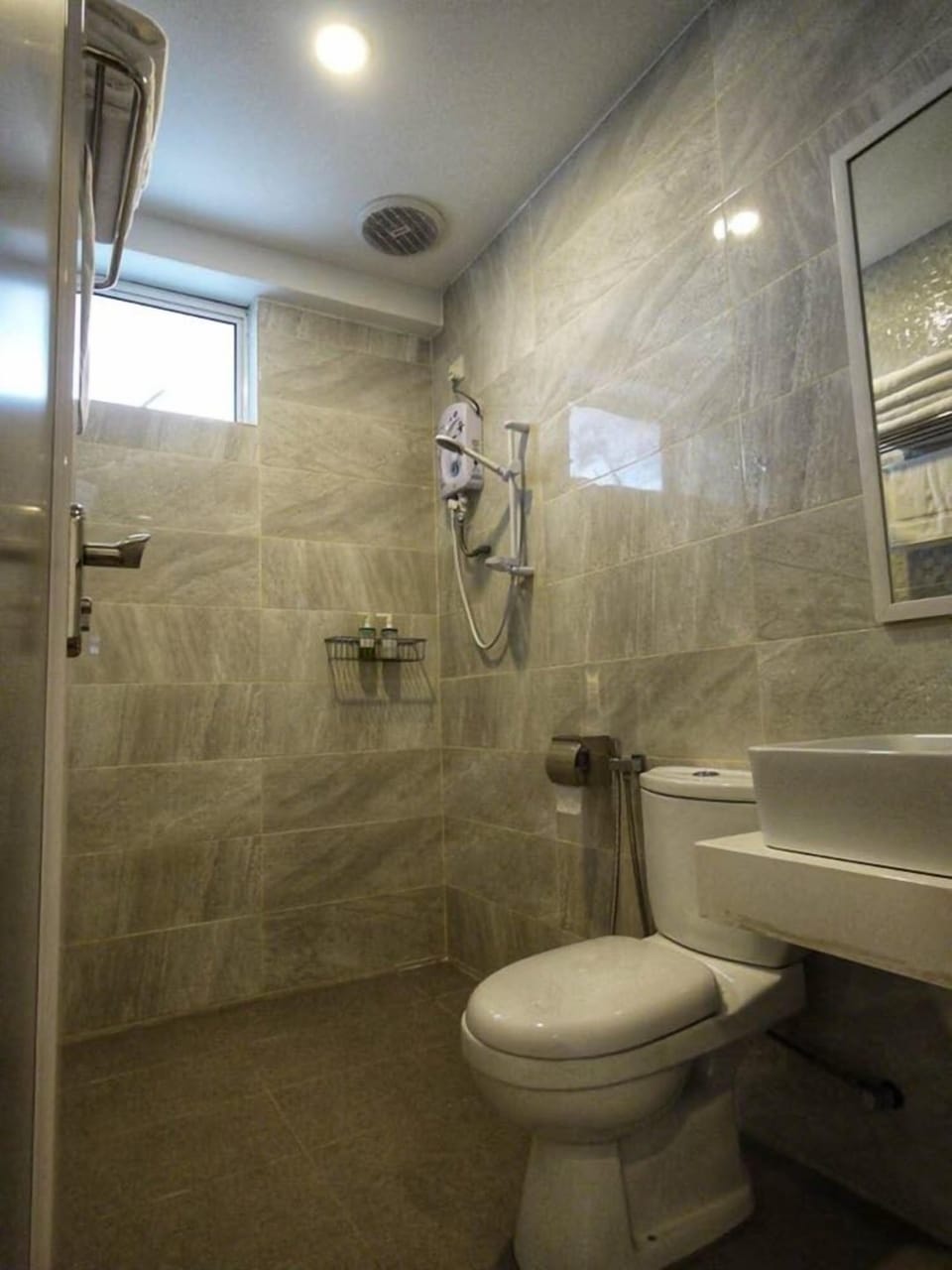 Shower, free toiletries, hair dryer, slippers