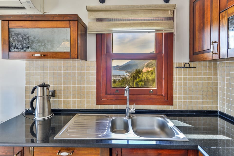 Apartment, 2 Bedrooms | Private kitchen | Full-size fridge, microwave, oven, stovetop