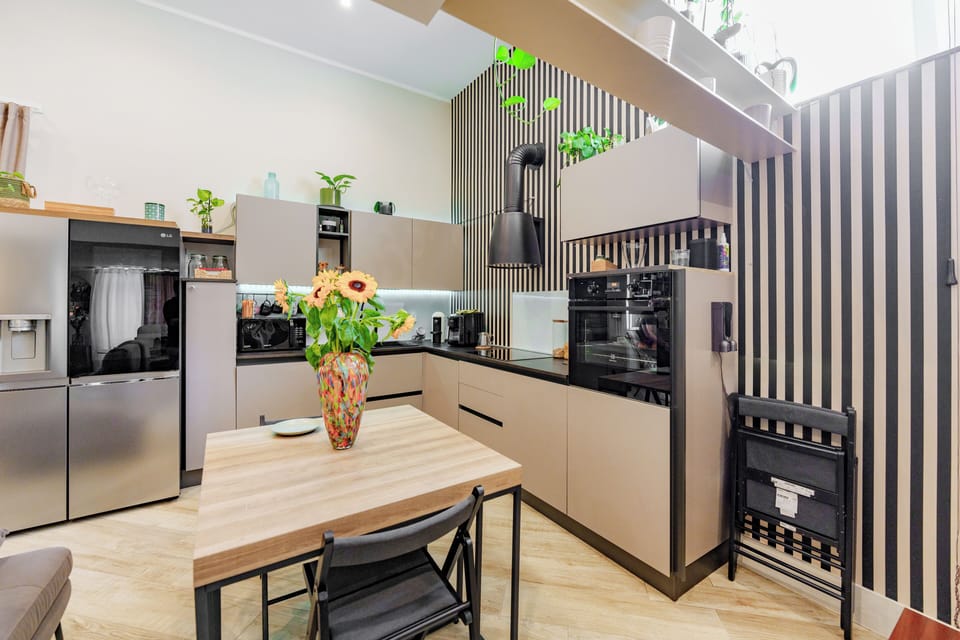 Superior Loft, 1 Bedroom | Private kitchen | Coffee/tea maker, electric kettle, cleaning supplies