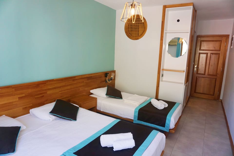 Standard Triple Room | WiFi (free), bed sheets