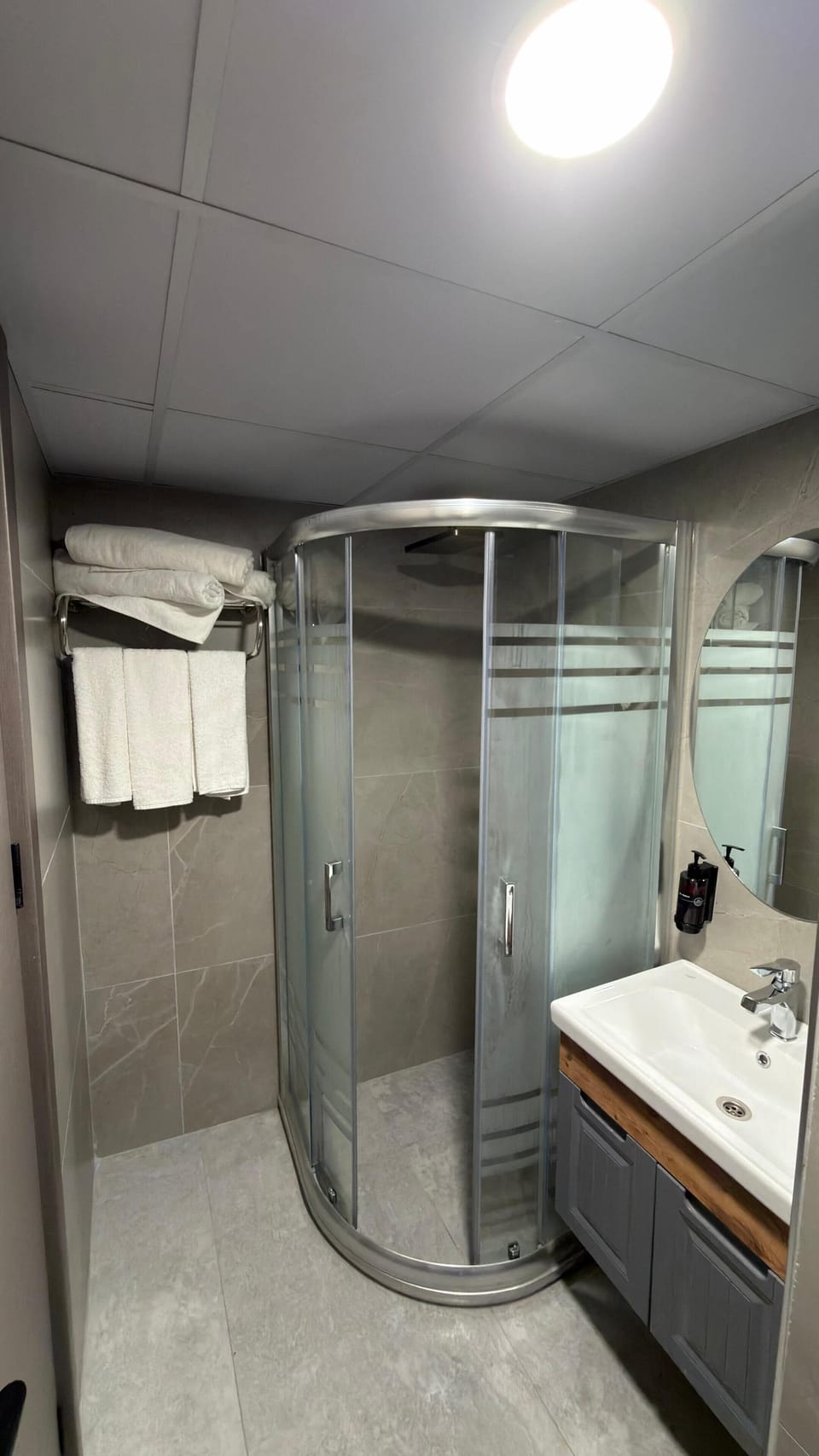 Shower, free toiletries, hair dryer, slippers