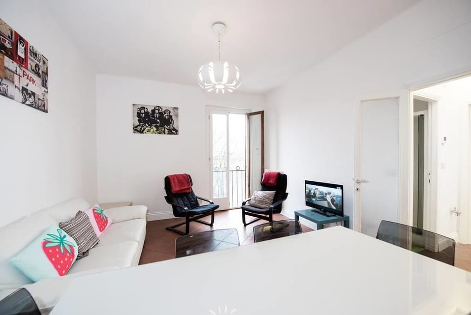 Basic Apartment, 3 Bedrooms | Living room | Flat-screen TV