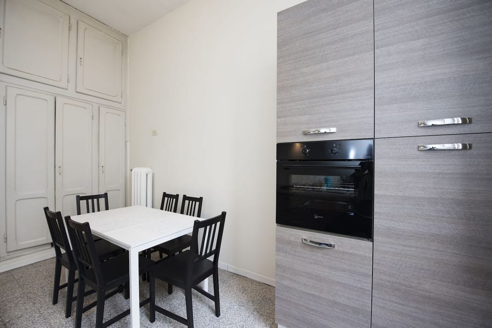 Basic Apartment, 4 Bedrooms | Private kitchen | Fridge, microwave, coffee/tea maker, cookware/dishes/utensils
