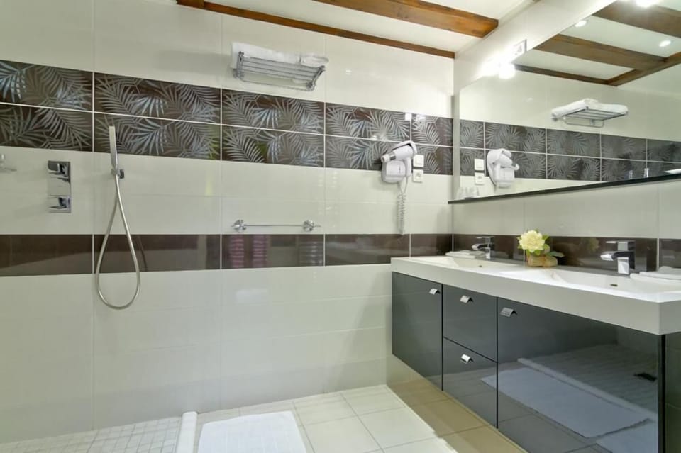 Shower, free toiletries, hair dryer, bathrobes