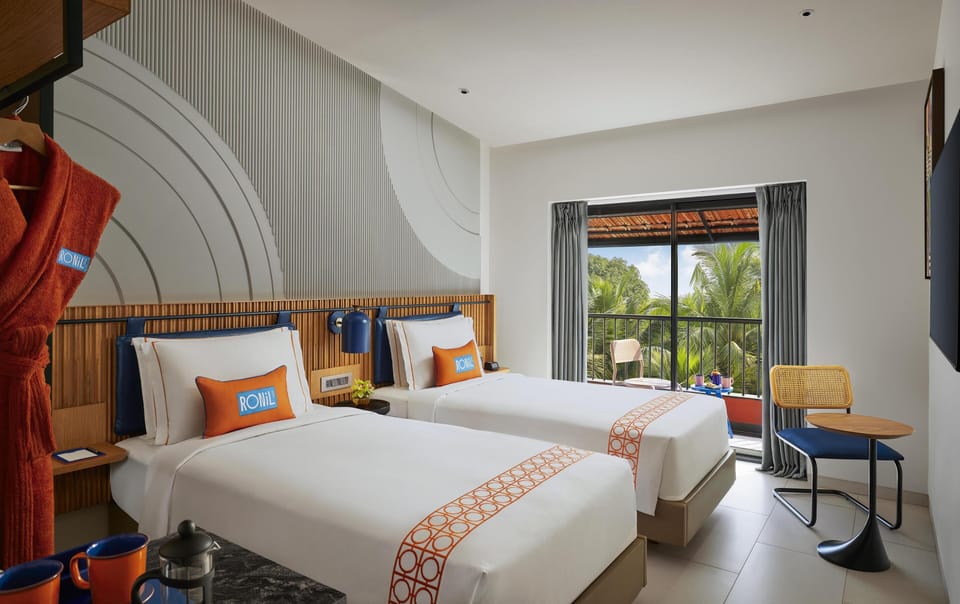 Twin Room with Balcony and Pool View | Premium bedding, down comforters, memory foam beds, in-room safe