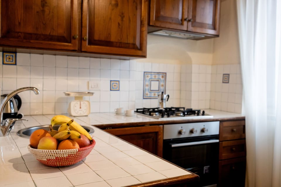 Comfort Apartment, 1 Bedroom (Azzurro) | Blackout drapes, iron/ironing board, free cribs/infant beds, free WiFi