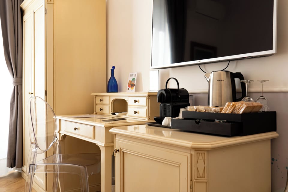 Premium bedding, down comforters, memory foam beds, in-room safe