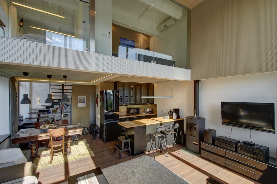 Flat-screen TV, fireplace, pay movies