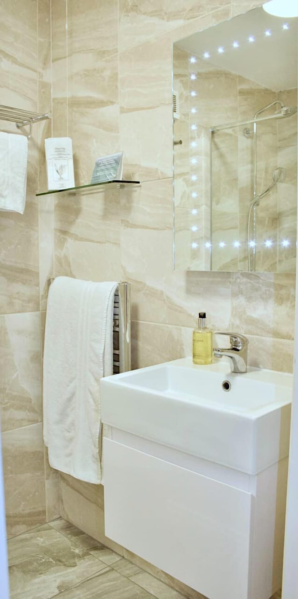 Shower, free toiletries, hair dryer, towels
