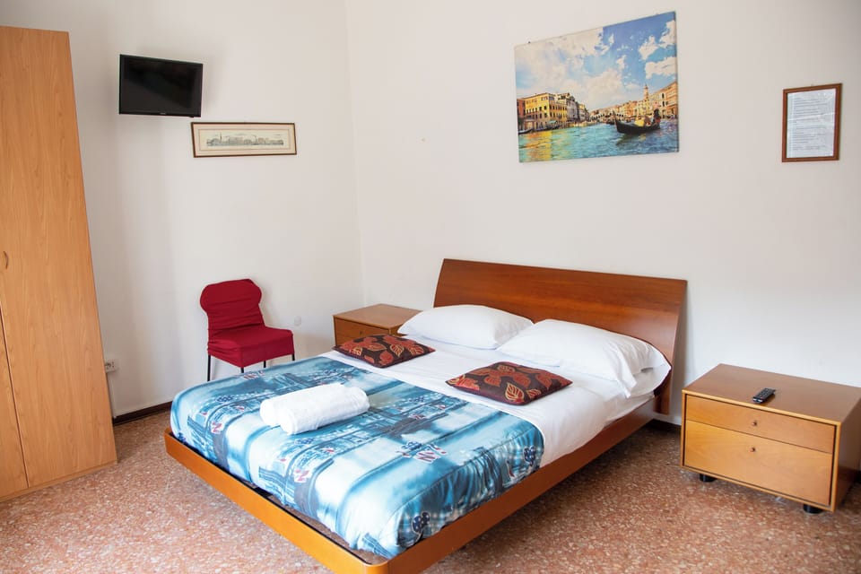 Standard Triple Room, Multiple Beds, Shared Bathroom, Park View | Down comforters, minibar, desk, laptop workspace