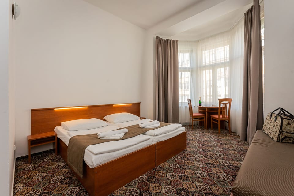 Double or Twin Room | In-room safe, WiFi, bed sheets