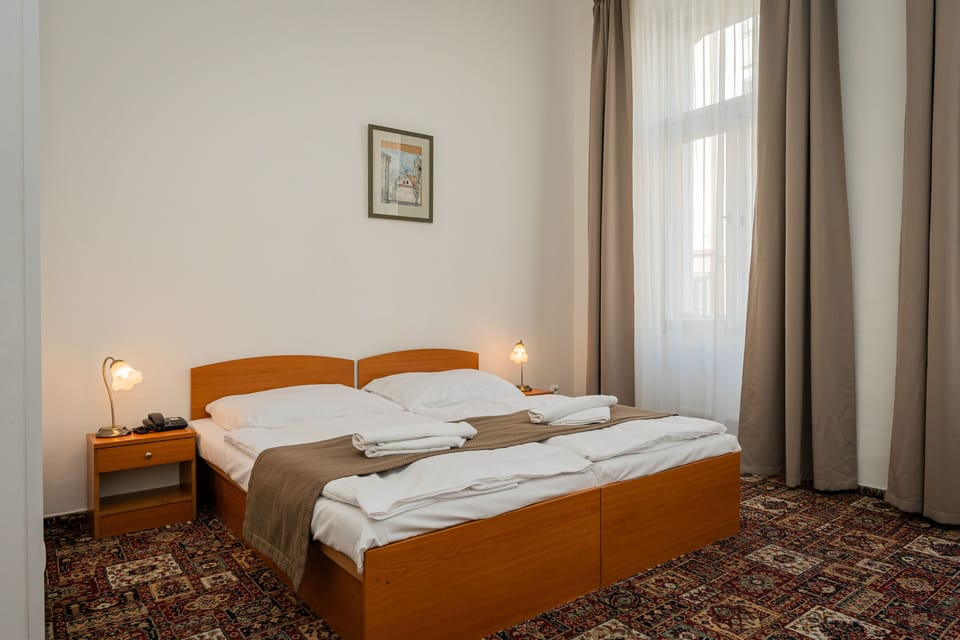 Double or Twin Room | In-room safe, WiFi (surcharge), bed sheets