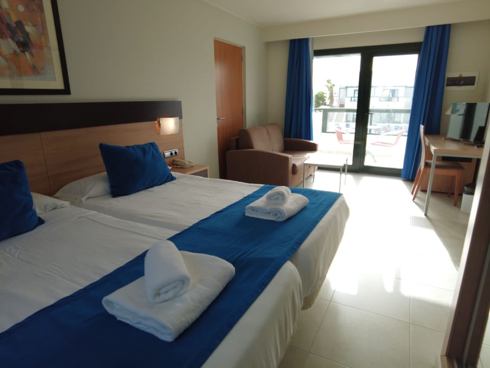 Minibar, desk, blackout drapes, soundproofing