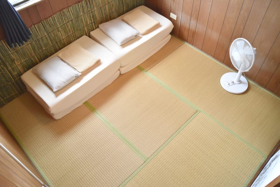 Economy Twin Room, Shared Bathroom | In-room safe, blackout drapes, free WiFi, bed sheets