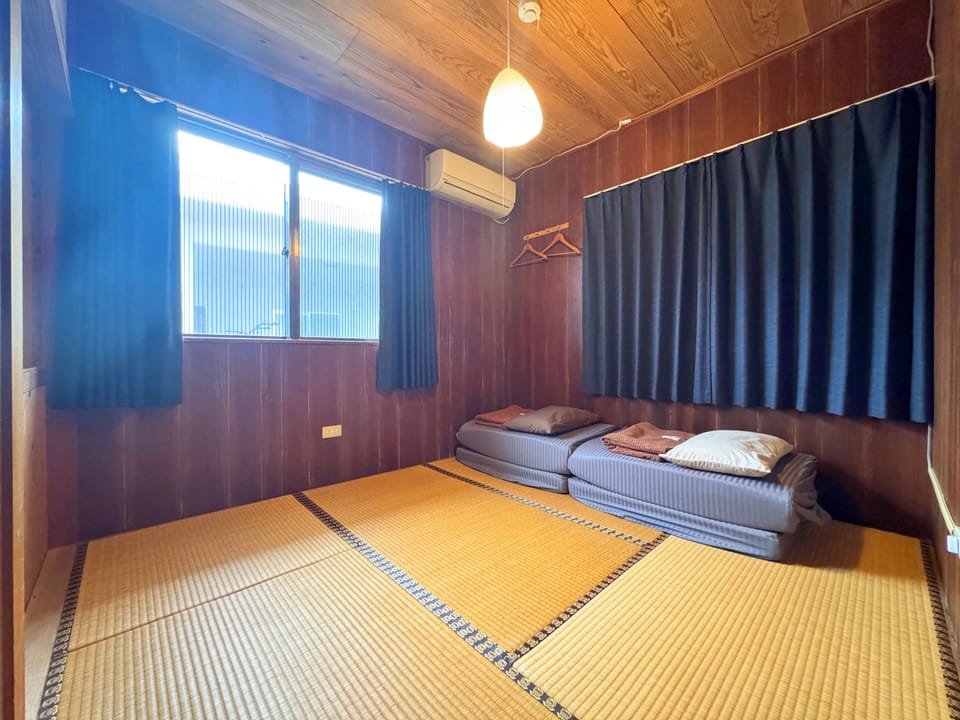 Economy Twin Room, Shared Bathroom | In-room safe, blackout drapes, free WiFi, bed sheets