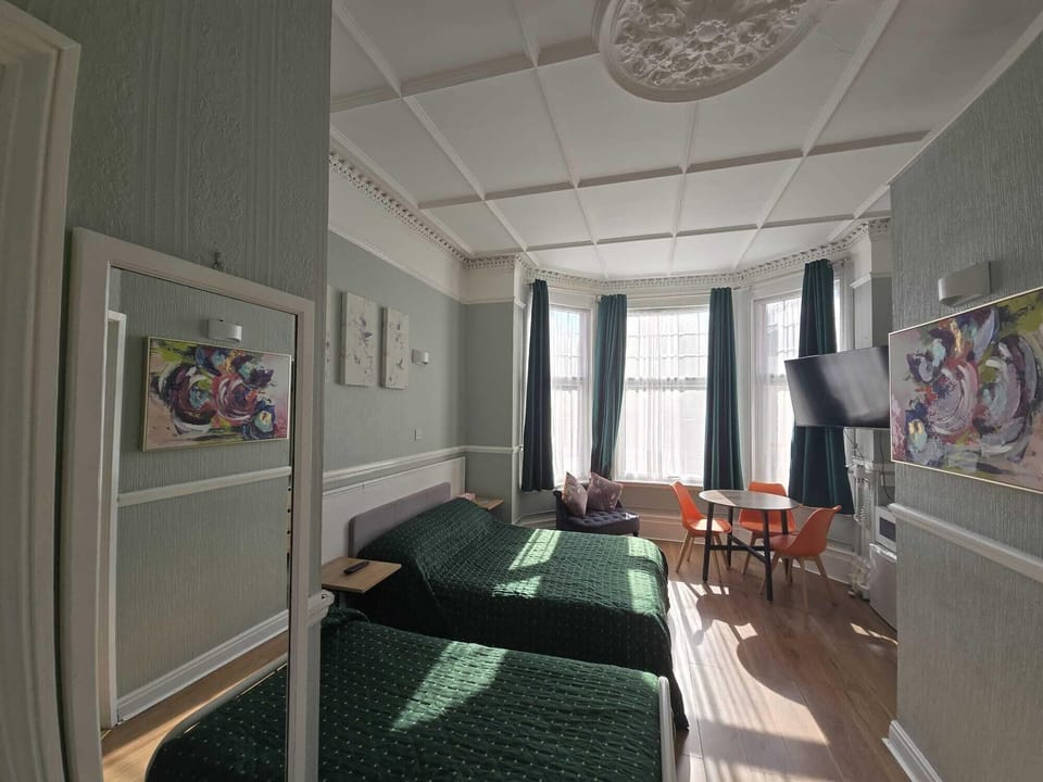 Family Room, Multiple Beds | In-room safe, individually decorated, individually furnished, desk