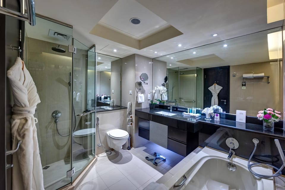Eco-friendly toiletries, hair dryer, bathrobes, slippers