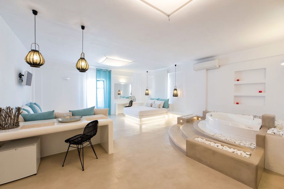 Luxury Suite, Sea View (Indoor Hot Tub) | 1 bedroom, minibar, in-room safe, individually decorated