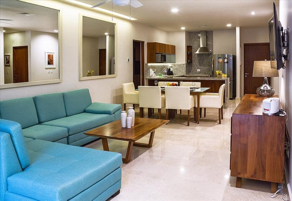 Grand Apartment, 3 Bedrooms, Courtyard Area | Living area | Flat-screen TV