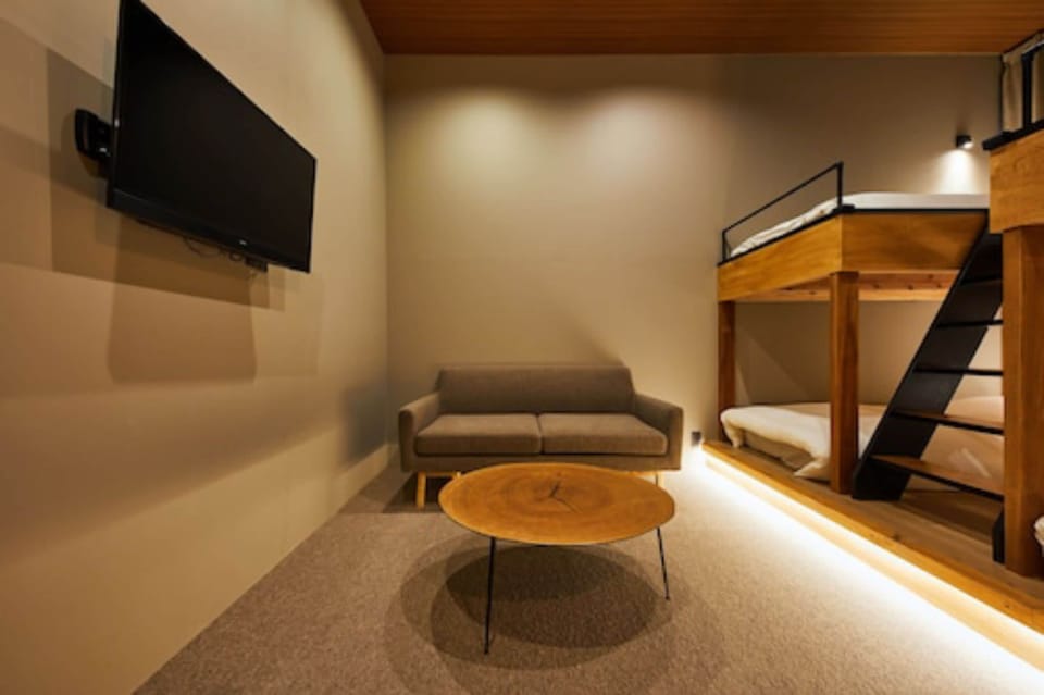 Comfort Quadruple Room, Non Smoking | Living area | Tablet