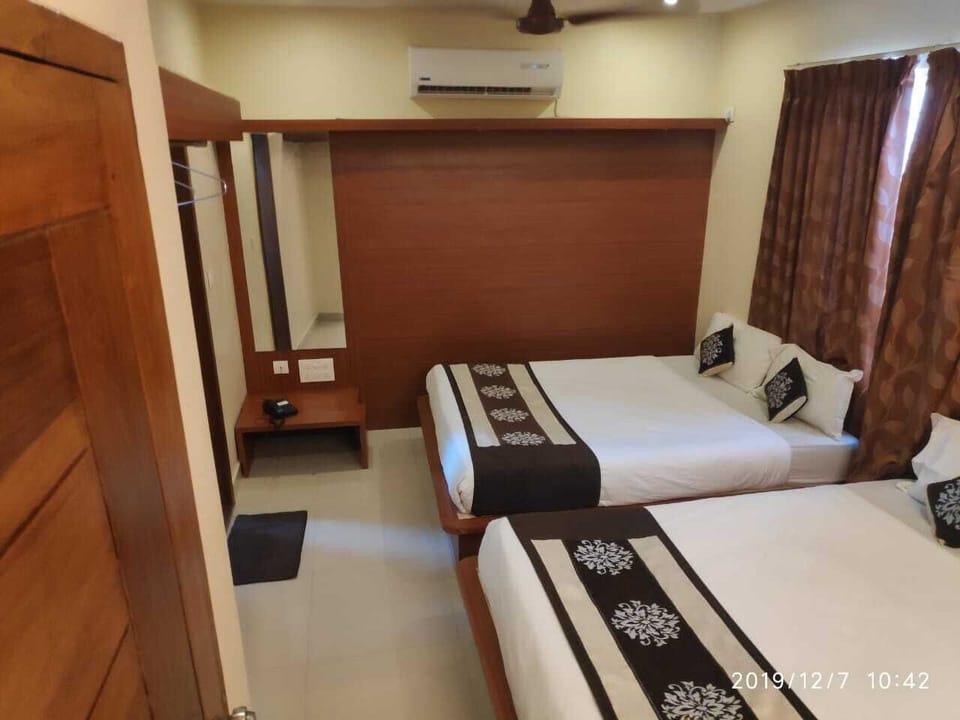 Family Quadruple Room, Accessible, Smoking | Living room | Flat-screen TV