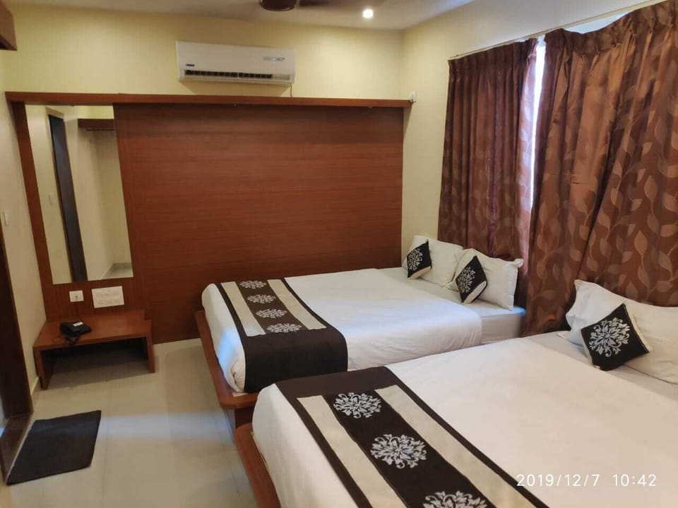 Family Quadruple Room, Accessible, Smoking | Living room | Flat-screen TV