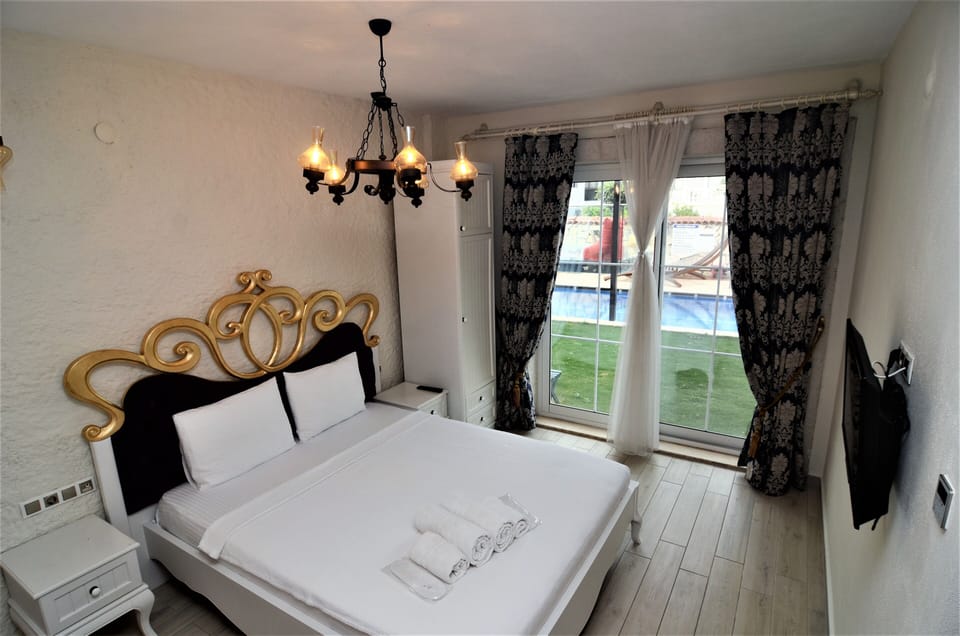 Standard Triple Room, Pool View | Egyptian cotton sheets, premium bedding, minibar, in-room safe