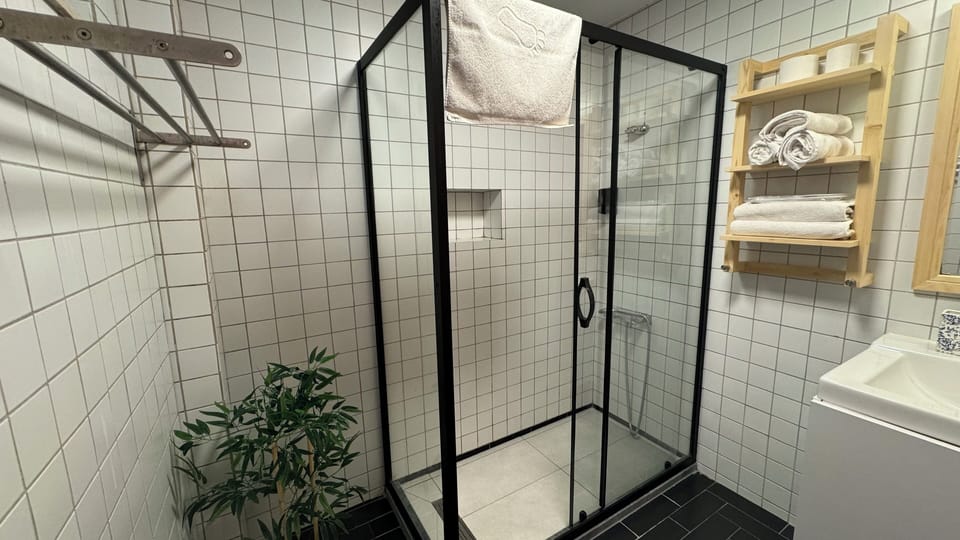Superior Triple Room, Patio | Bathroom | Shower, rainfall showerhead, free toiletries, hair dryer