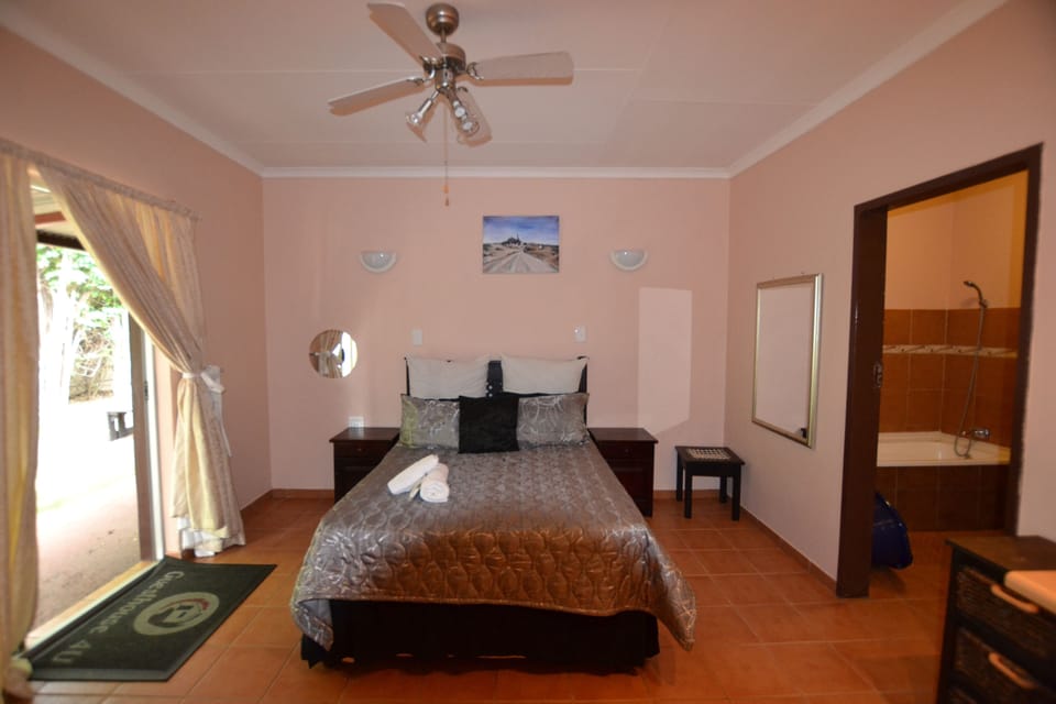 Basic Double Room, Private Bathroom | Desk, laptop workspace, blackout drapes, iron/ironing board (on request)