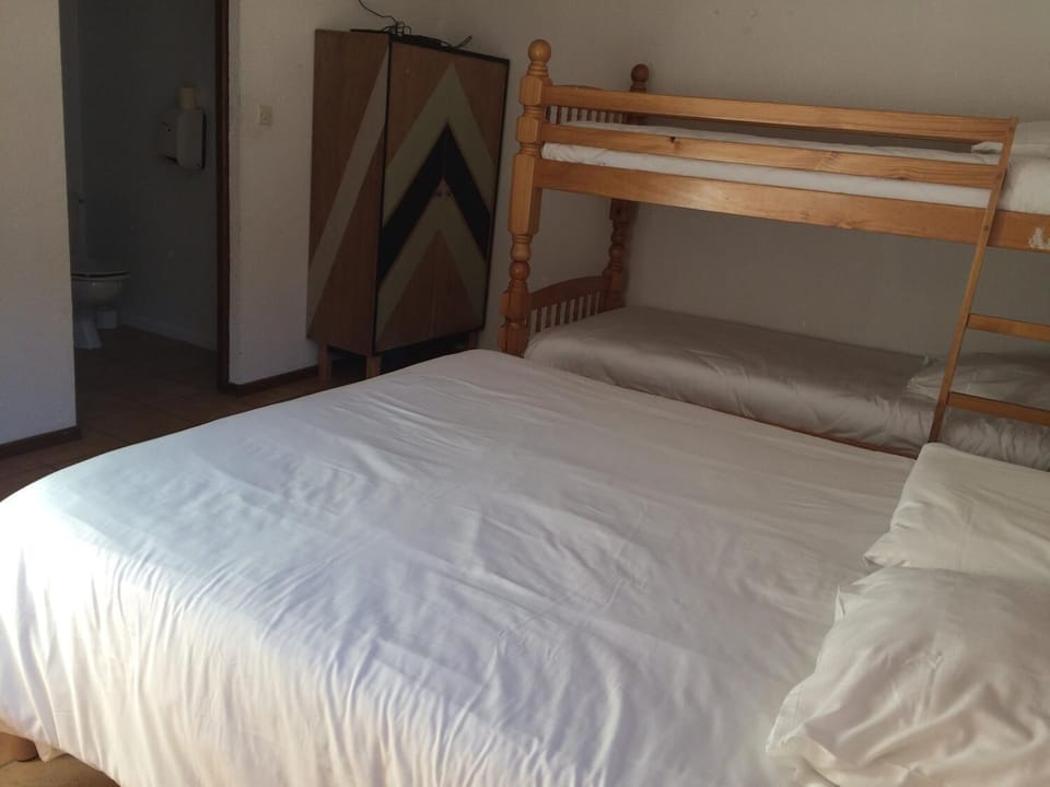 Economy Quadruple Room | Blackout drapes, bed sheets, wheelchair access