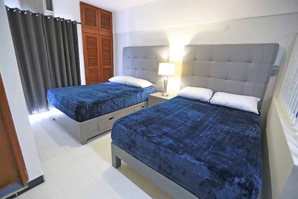 Basic Studio Suite, 2 Double Beds | Individually furnished, desk, laptop workspace, iron/ironing board