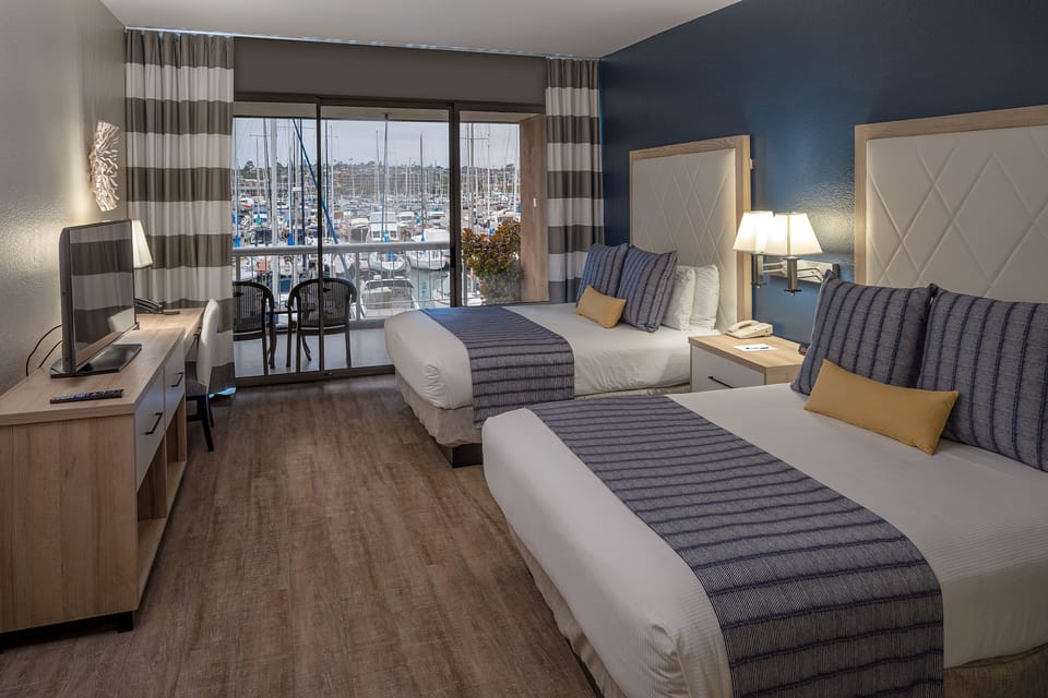 Standard Room, 2 Queen Beds, Marina View, Ground Floor | Hypo-allergenic bedding, in-room safe, desk, laptop workspace