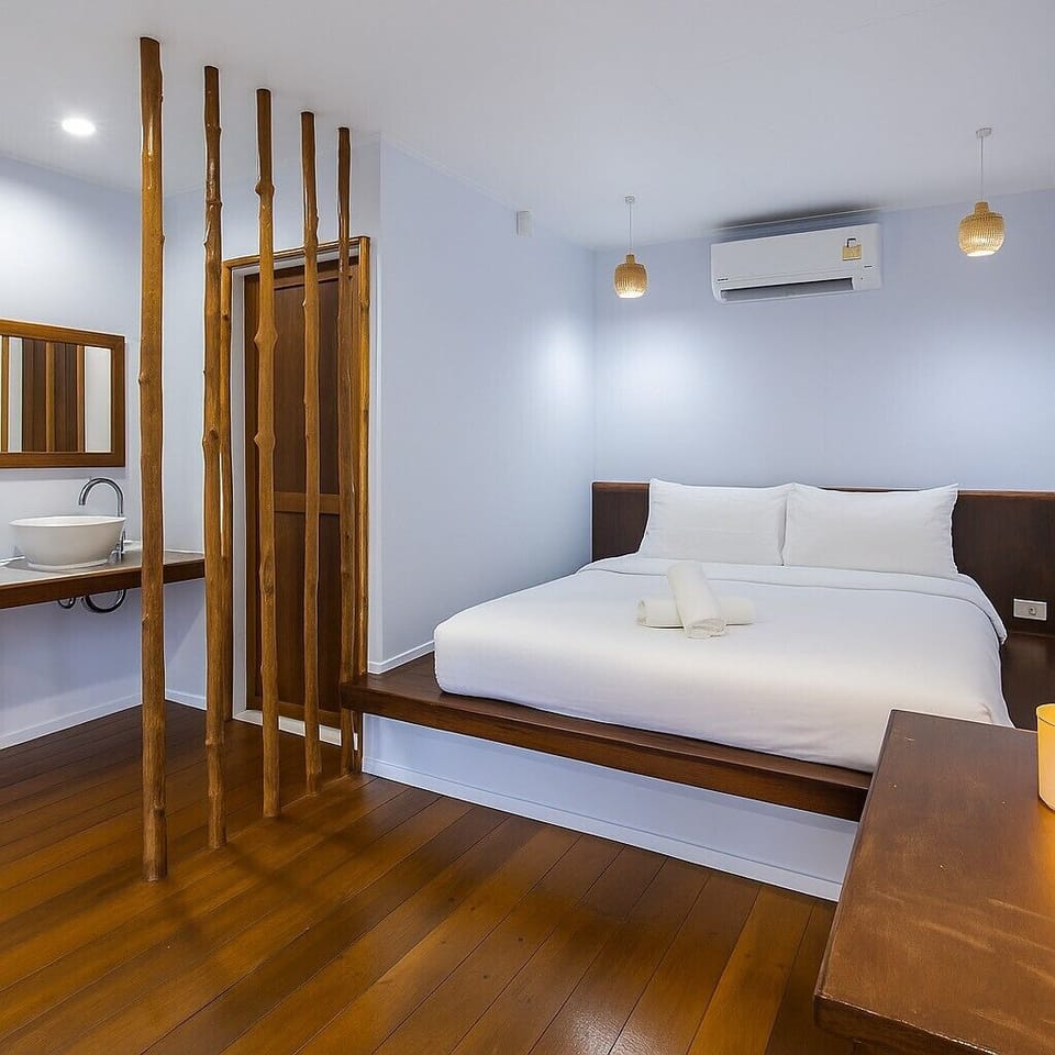 Standard Room | 1 bedroom, desk, blackout drapes, iron/ironing board