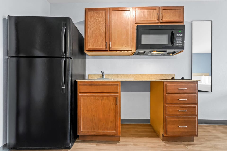 Standard Room, 2 Queen Beds, Non Smoking | In-room safe, desk, laptop workspace, iron/ironing board