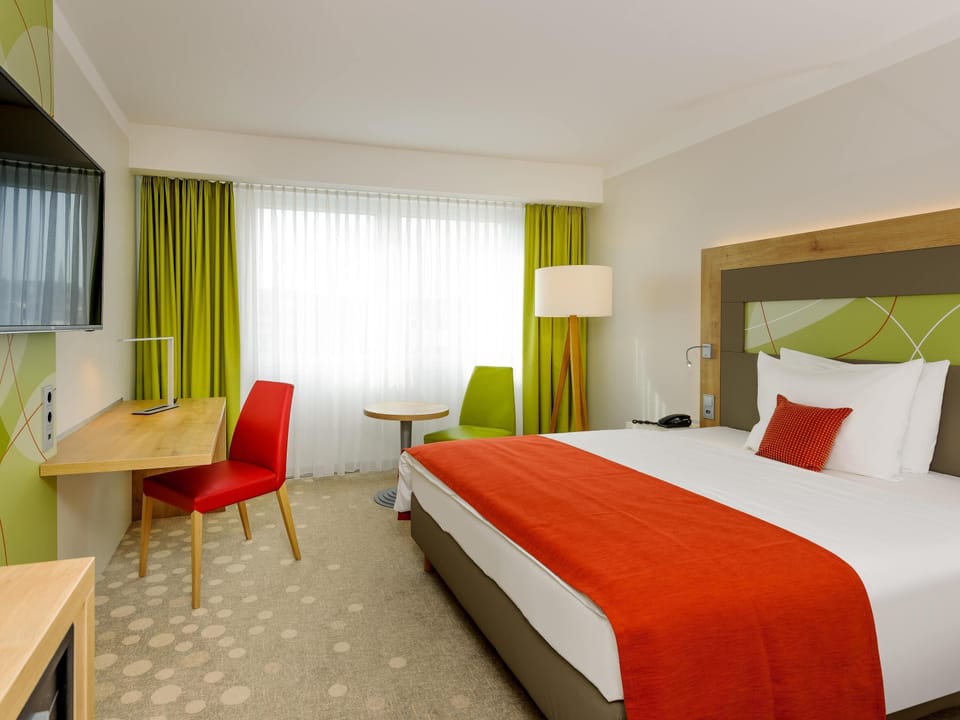 Standard Double Room, 1 Double Bed | Minibar, in-room safe, desk, blackout drapes