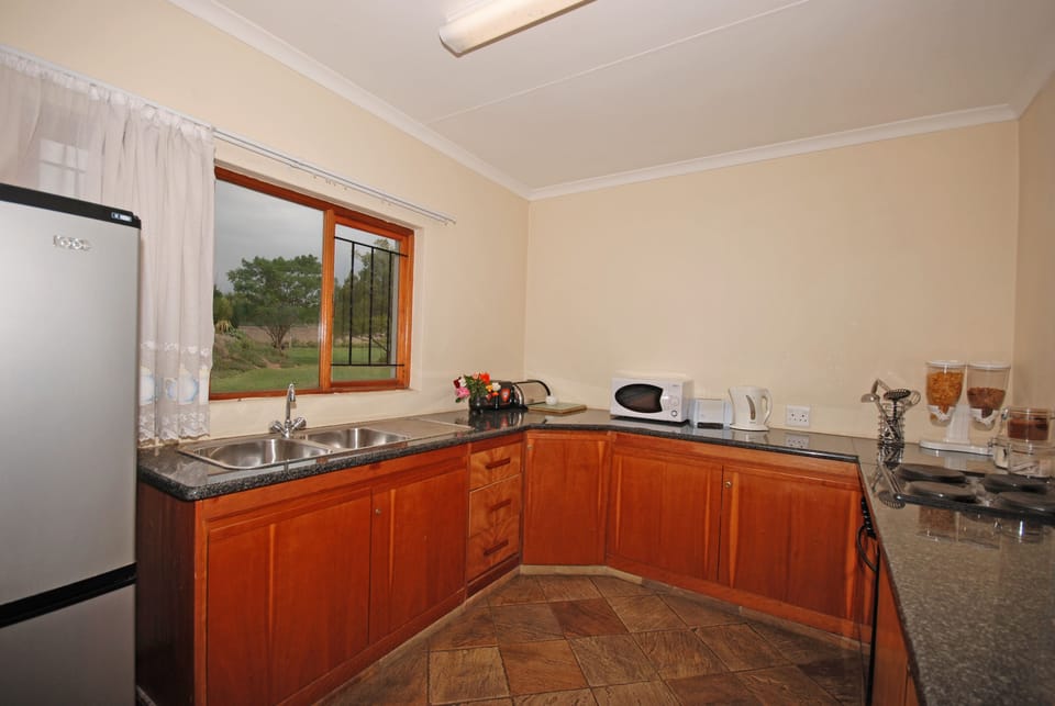 Fridge, microwave, electric kettle, toaster