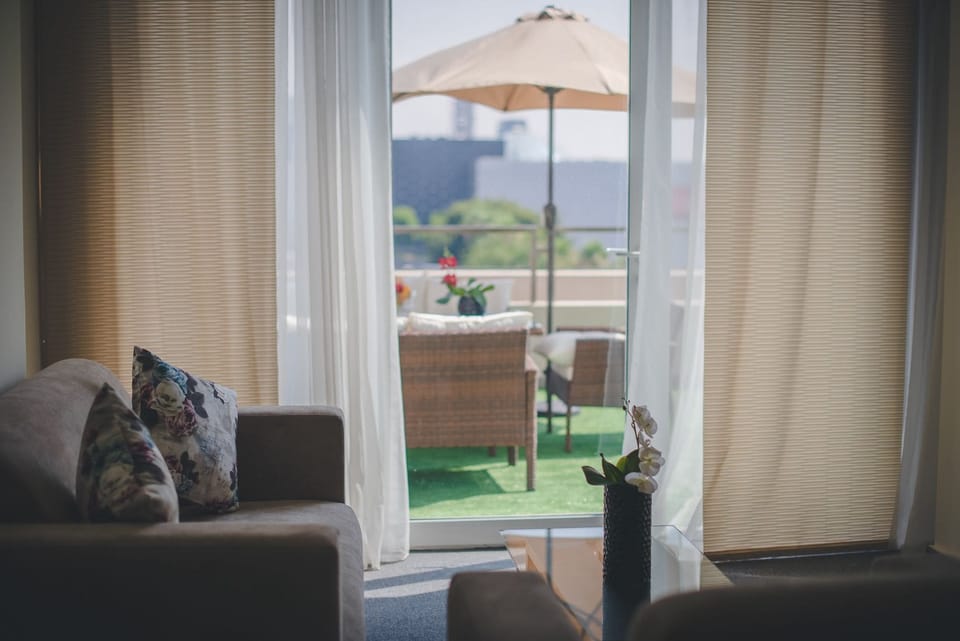 Executive Suite, 1 Bedroom, City View | Living area | LED TV