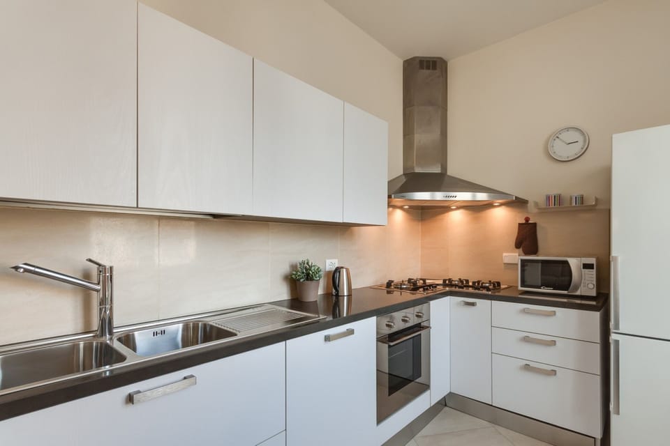 Apartment, 2 Bedrooms | Private kitchen | Fridge, microwave, oven, stovetop