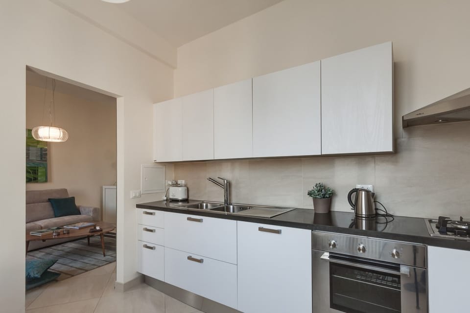 Apartment, 2 Bedrooms | Private kitchen | Fridge, microwave, oven, stovetop