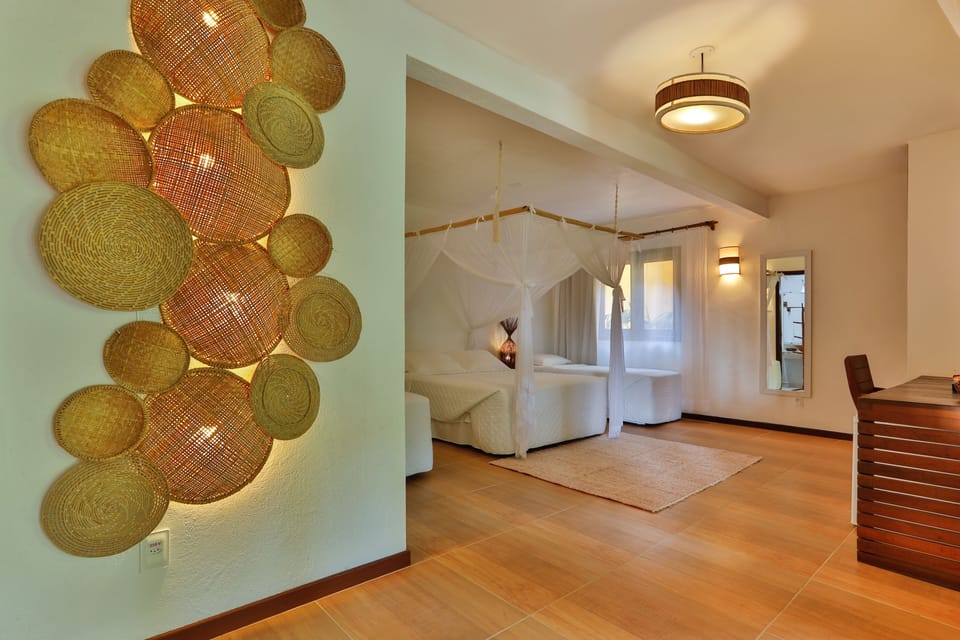 Quarto Quadruplo, com sacada, terreo, vista para o jardim | Premium bedding, minibar, blackout drapes, free WiFi