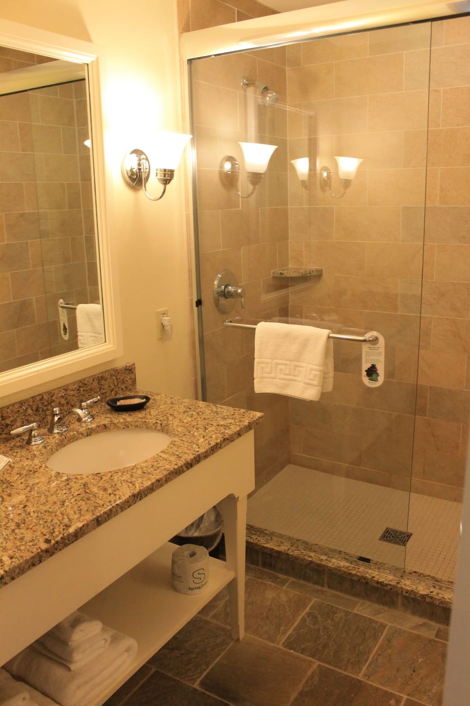 Designer toiletries, hair dryer, towels