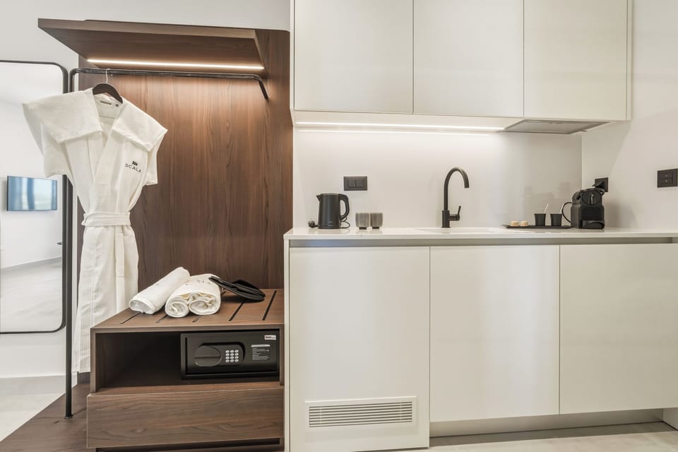Suite, 1 Bedroom, Sea View | Private kitchen | Espresso maker, coffee/tea maker, mini-fridge, electric kettle