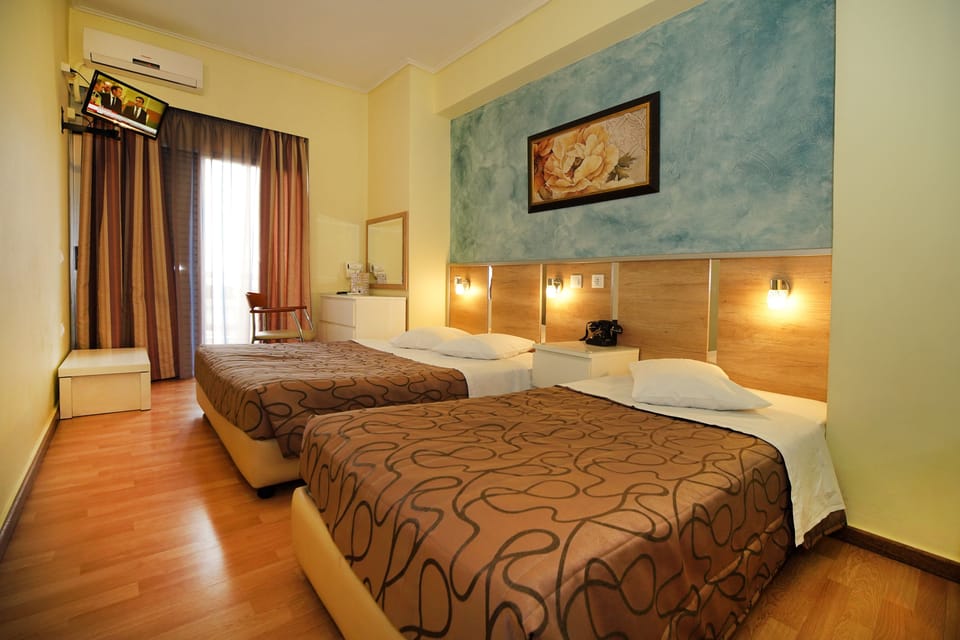 Triple Room (1 double bed  & 1 single bed) | In-room safe, desk, blackout drapes, soundproofing