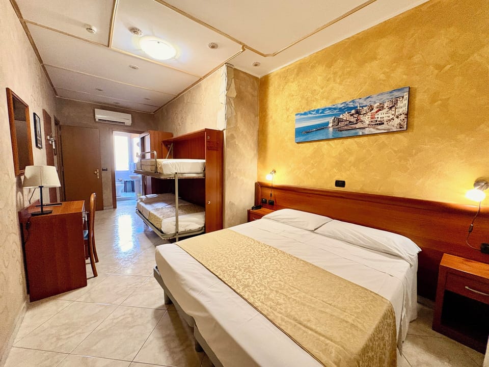 Family Quadruple Room | In-room safe, desk, WiFi (free), bed sheets