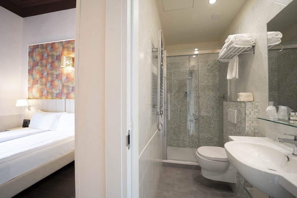 Shower, free toiletries, hair dryer, towels