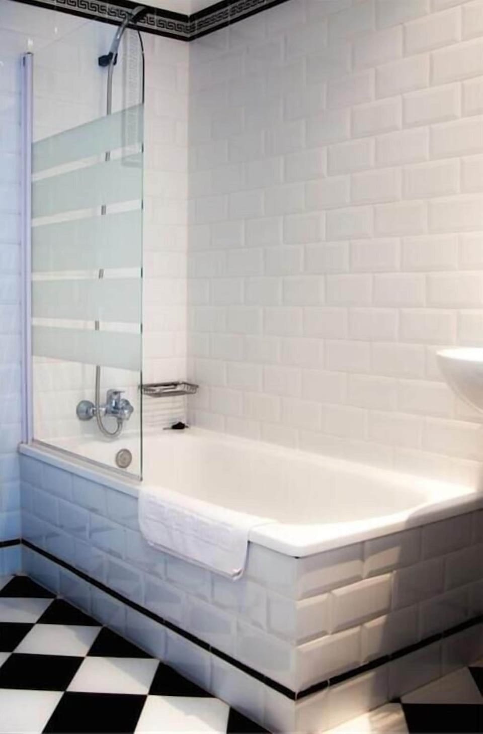 Bathtub, hair dryer, towels, soap