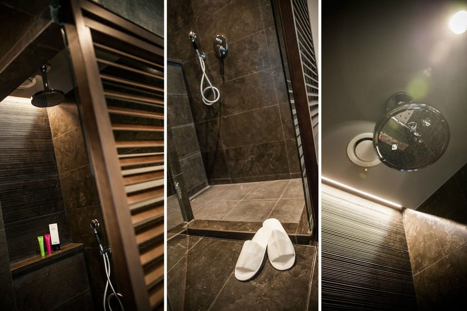 Deep soaking tub, rainfall showerhead, free toiletries, bidet