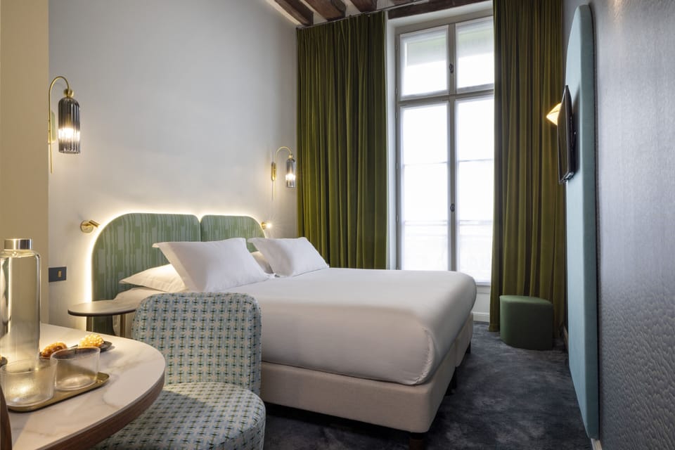 Premium bedding, in-room safe, individually decorated, desk