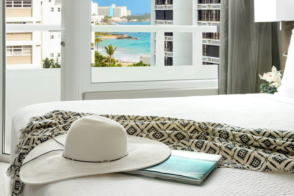 Room, 1 King Bed, Balcony | In-room safe, desk, laptop workspace, blackout drapes