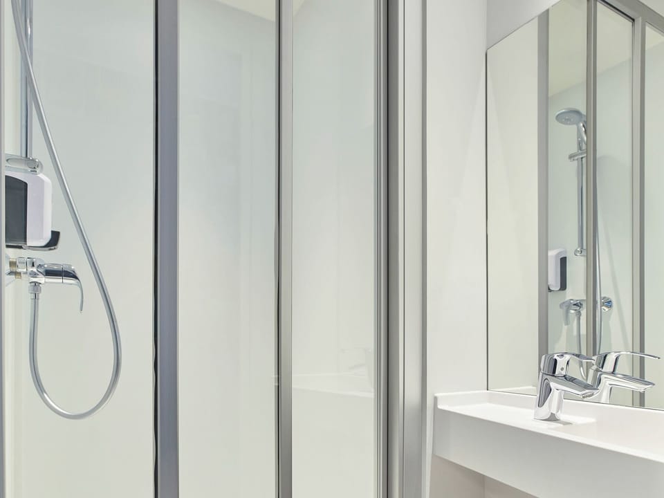 Family Room, Multiple Beds | Bathroom | Shower, eco-friendly toiletries, towels, soap